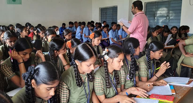 Childern  sitting in classfroom image